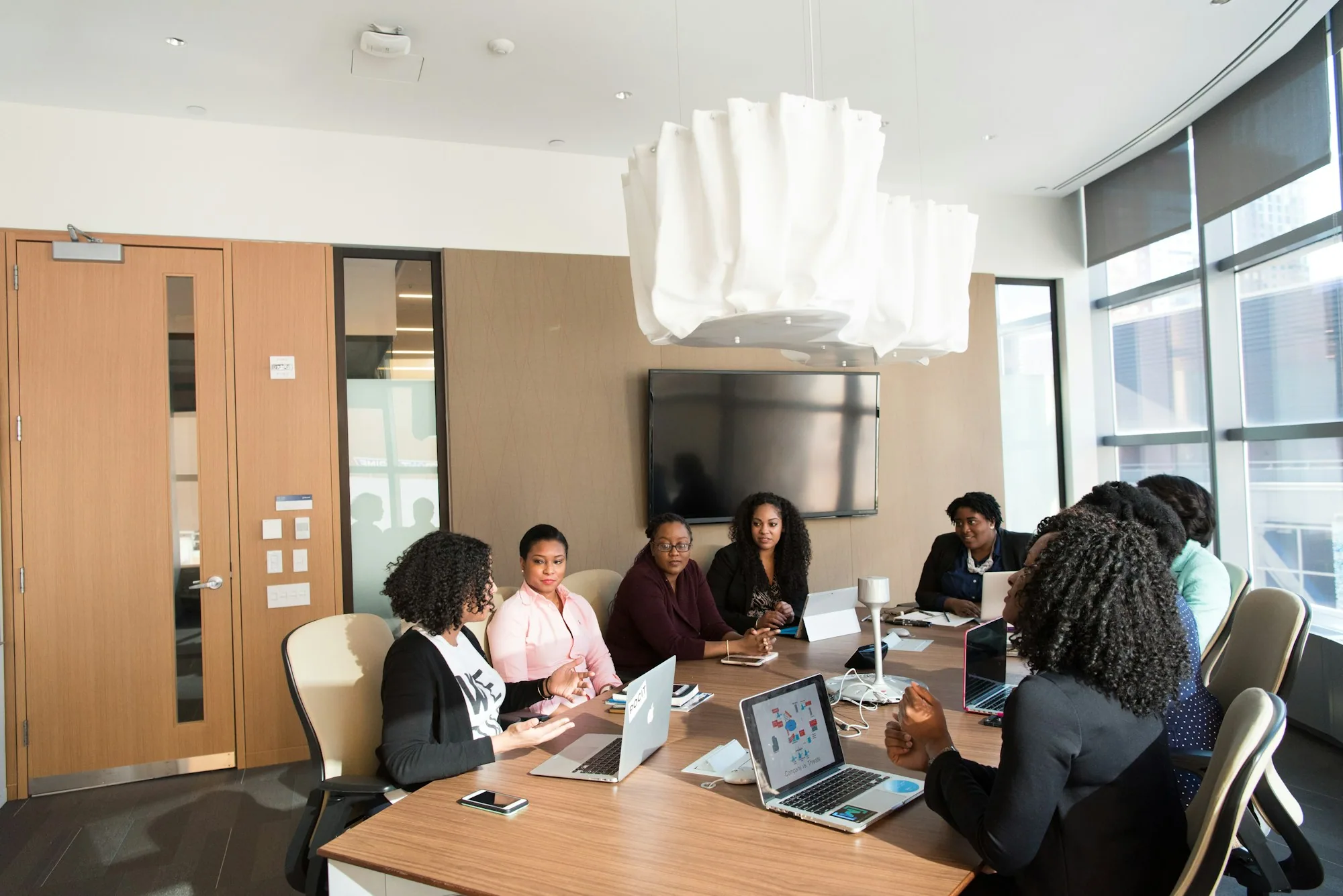 Business leaders working together at a conference table